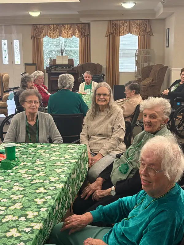 Residents smiling on St. Patrick Day
